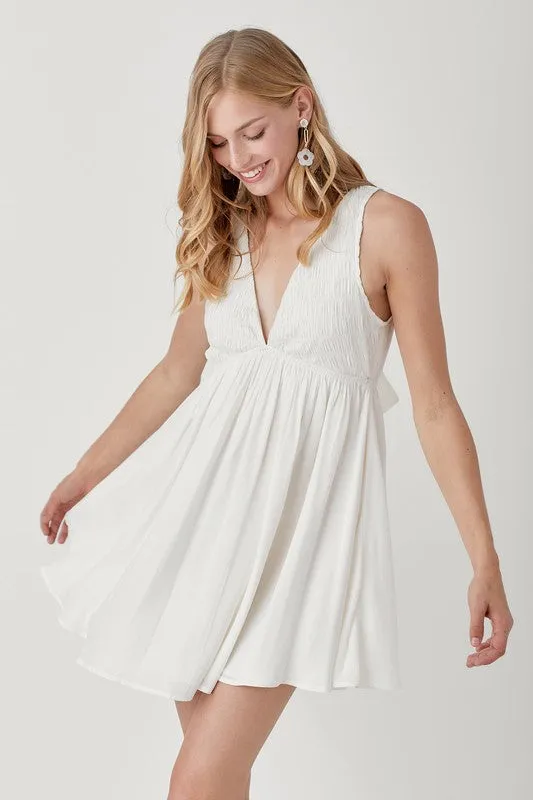 IN THE LIGHT V NECK SMOCK SLEEVELESS DRESS