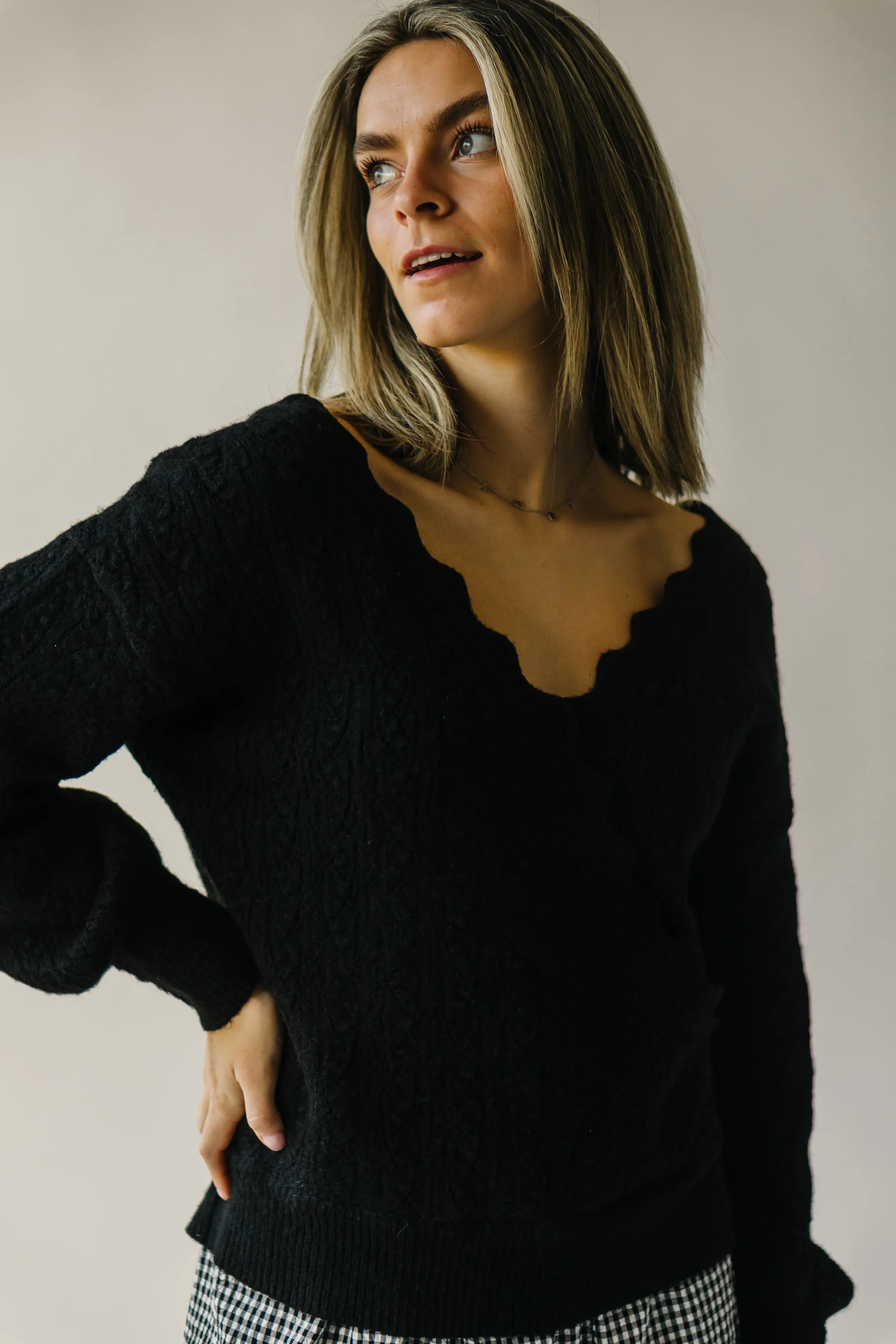 The Tagger Knit Wrap Sweater in Black