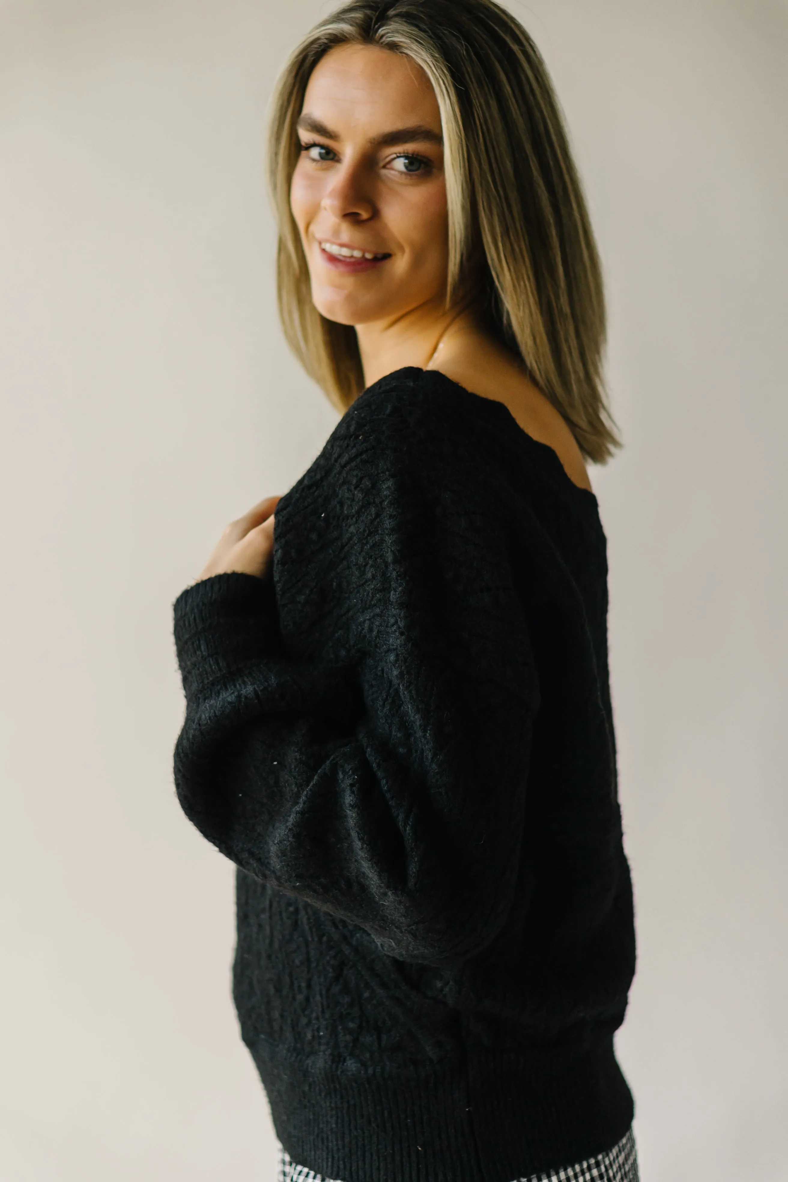 The Tagger Knit Wrap Sweater in Black