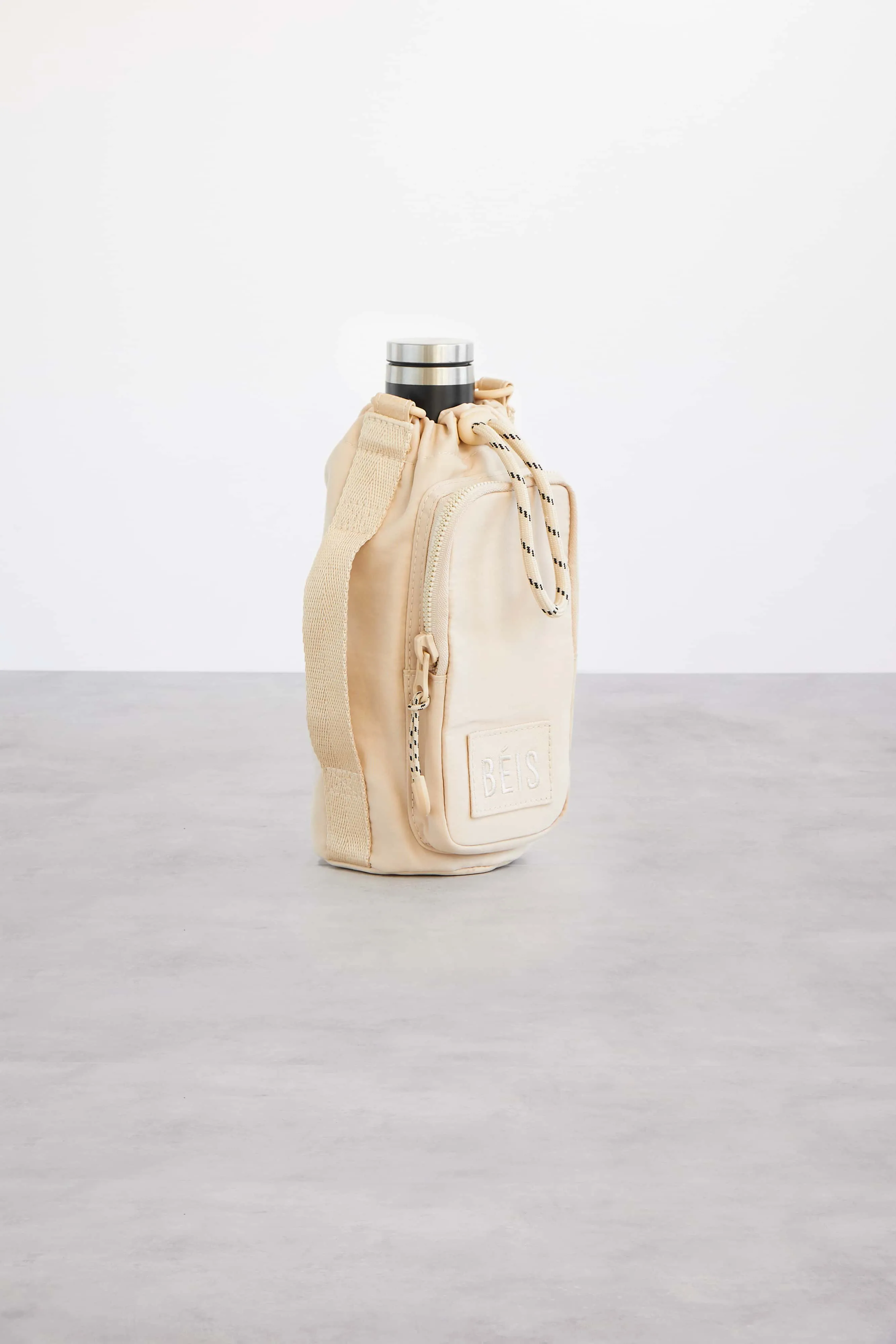 The Water Bottle Sling in Beige